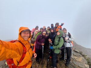 The Spread a Smile team at the summit of Snowdon (Yr Wyddfa))