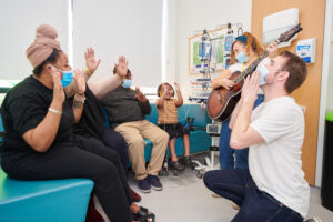 Family in hospital enjoying Spread a Smile entertainment